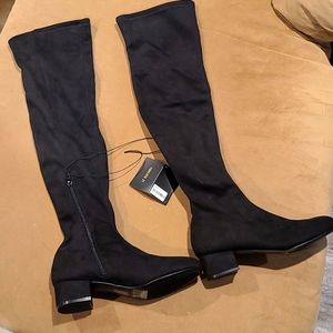 Ladies high black boots. New never worn still with tags.
